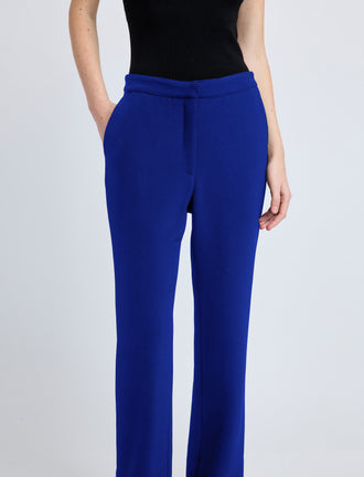 Proenza Schouler detail image of model wearing Alexia Pant in Bi-Stretch Suiting in cobalt