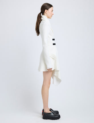 Proenza Schouler Side full length image of model wearing Reinhardt Dress in Wool Cashmere Knit in Off White