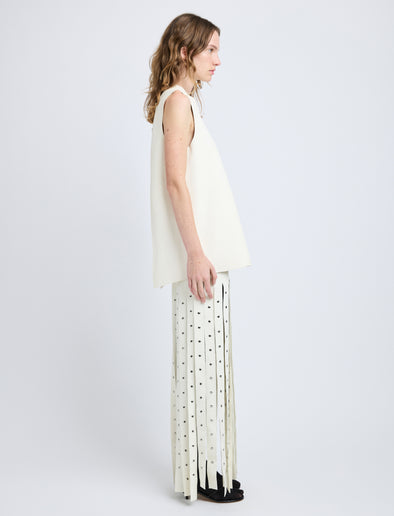 Proenza Schouler Side full length image of model wearing Effe Skirt in Compact Viscose Knit in Ivory