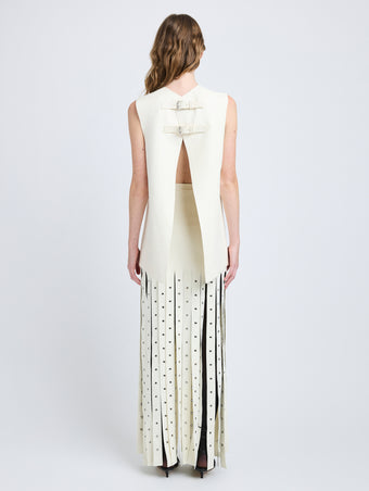 Proenza Schouler Back full length image of model wearing Effe Skirt in Compact Viscose Knit in Ivory