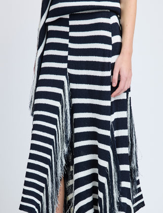 Proenza Schouler Detail image of model wearing Yves Skirt in Stripe Fringed Knit in Navy Multi
