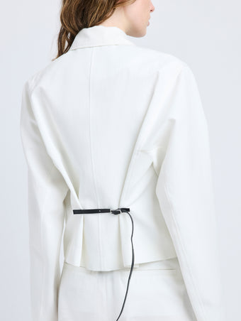 Proenza Schouler Detail image of model wearing Thelma Jacket in Cotton Linen Suiting in White