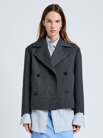 Proenza Schouler Front cropped image of model wearing Nola Jacket in Textured Suiting in Charcoal Melange