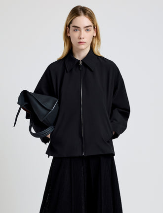 Proenza Schouler Front cropped image of model wearing Sibyl Jacket in Stretch Nylon in Black