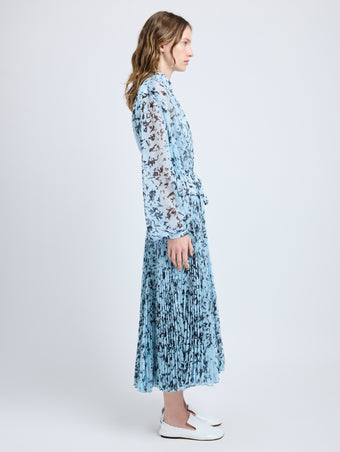 Proenza Schouler Side full length image of model wearing Jones Dress in Printed Crinkle Chiffon in Sky Blue Multi