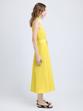 Proenza Schouler Side full length image of model wearing Dorothy Dress in Eco Cotton Poplin in Yellow