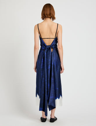 Proenza Schouler Back full length image of model wearing Wilma Dress in Double Printed Silk Twill in Cobalt Multi with back straps tied