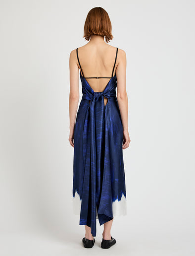 Proenza Schouler Back full length image of model wearing Wilma Dress in Double Printed Silk Twill in Cobalt Multi with back straps tied