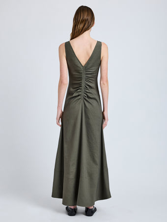 Proenza Schouler Back full length image of model wearing Remi Dress in Eco Stretch Linen Viscose in Fatigue