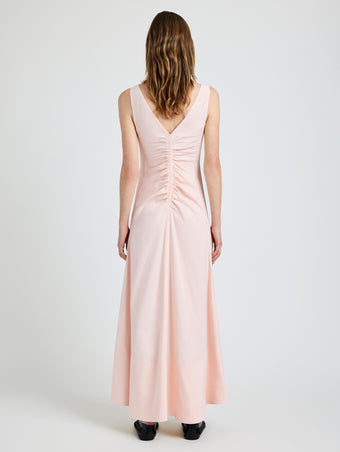Proenza Schouler Back full length image of model wearing Remi Dress in Eco Stretch Linen Viscose in Pale Pink