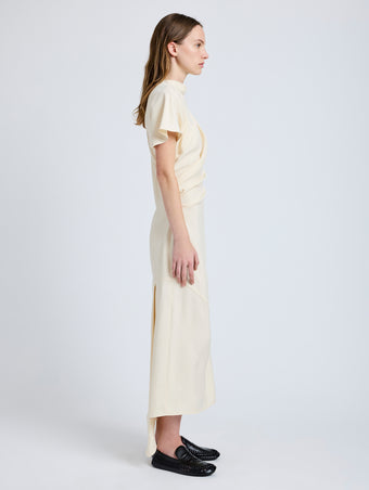 Proenza Schouler Side full length image of model wearing Hallie Dress in Hammered Viscose in Champagne