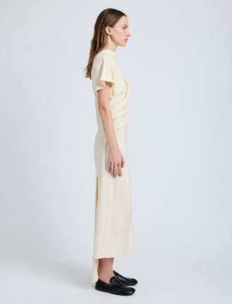 Proenza Schouler Side full length image of model wearing Hallie Dress in Hammered Viscose in Champagne
