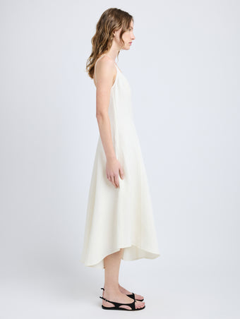 Proenza Schouler Side full length image of model wearing Elaine Dress in Cotton Viscose Linen in Ecru
