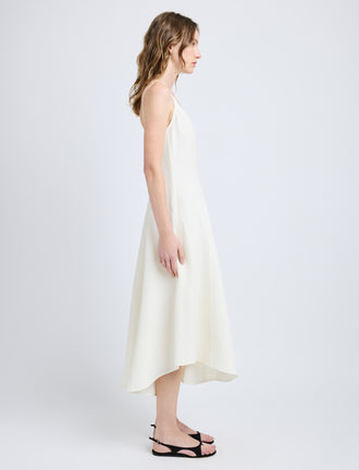 Proenza Schouler Side full length image of model wearing Elaine Dress in Cotton Viscose Linen in Ecru
