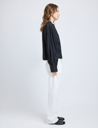 Proenza Schouler side image of model wearing Grayson Top in Eco Cotton Poplin in black