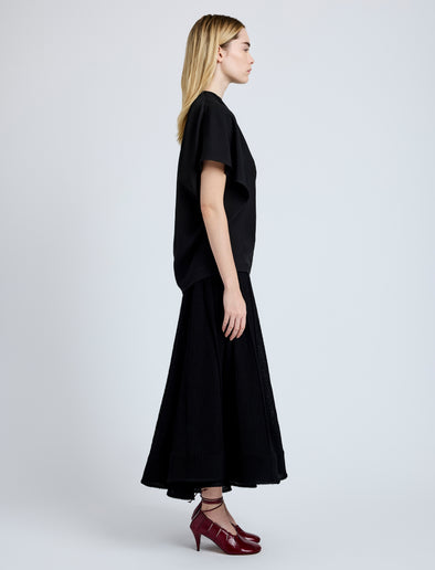 Proenza Schouler Side full length image of model wearing Etta Top in Hammered Viscose in Black