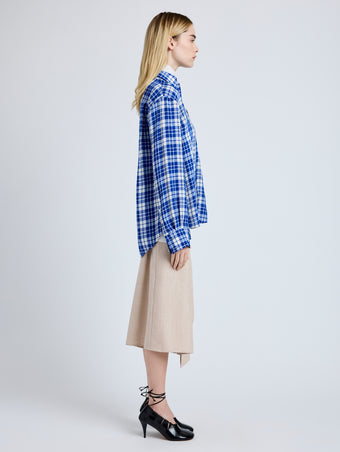 Proenza Schouler Side full length image of model wearing Bronwen Top in Crinkled Plaid in Cobalt Multi