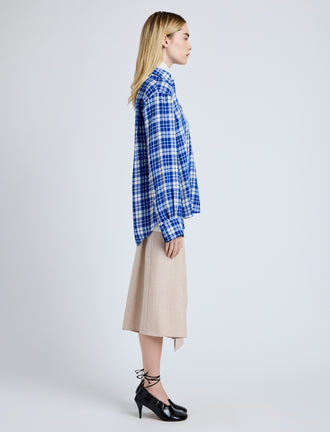 Proenza Schouler Side full length image of model wearing Bronwen Top in Crinkled Plaid in Cobalt Multi