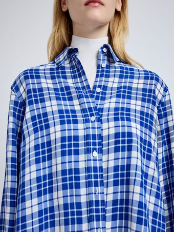 Proenza Schouler Detail image of model wearing Bronwen Top in Crinkled Plaid in Cobalt Multi