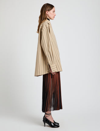 Proenza Schouler Side full length image of model wearing Addy Top in Stripe Cotton Silk Poplin in Taupe Multi