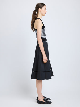 Proenza Schouler Side full length image of model wearing Laci Skirt in Eco Cotton Poplin in Black