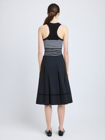 Proenza Schouler Back full length image of model wearing Laci Skirt in Eco Cotton Poplin in Black
