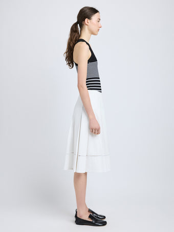 Proenza Schouler side image of model wearing Laci Skirt in Eco Cotton Poplin in white