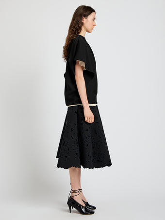 Proenza Schouler Side full length image of model wearing Olene Skirt in Broderie Anglaise in Black