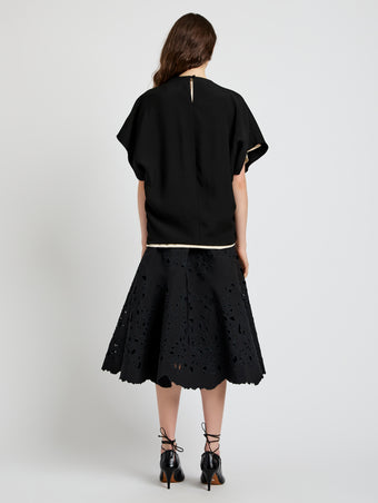 Proenza Schouler Back full length image of model wearing Olene Skirt in Broderie Anglaise in Black