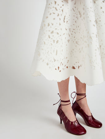 Proenza Schouler Detail image of model wearing Olene Skirt in Broderie Anglaise in White