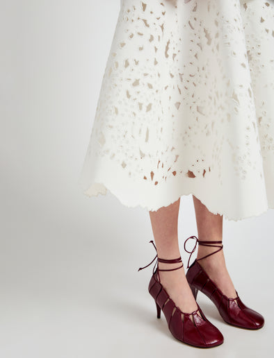Proenza Schouler Detail image of model wearing Olene Skirt in Broderie Anglaise in White