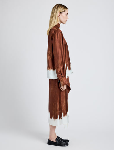 Proenza Schouler Side full length image of model wearing Amery Skirt in Double Printed Silk Twill in Sienna Multi