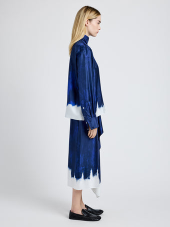 Proenza Schouler Side full length image of model wearing Amery Skirt in Double Printed Silk Twill in Cobalt Multi