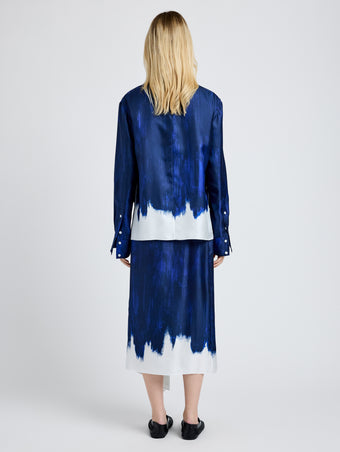 Proenza Schouler Back full length image of model wearing Amery Skirt in Double Printed Silk Twill in Cobalt Multi