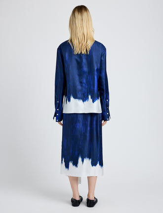 Proenza Schouler Back full length image of model wearing Amery Skirt in Double Printed Silk Twill in Cobalt Multi