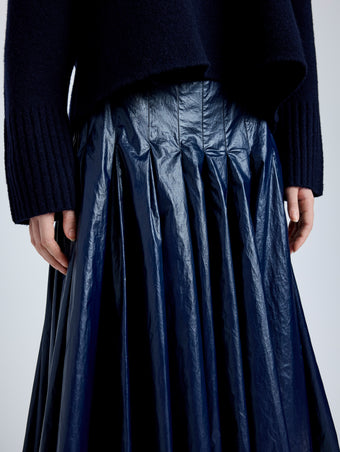 Proenza Schouler Detail image of model wearing Petra Skirt in Lacquered Cotton in Navy