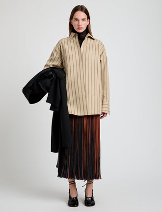 Proenza Schouler Front full length image of model wearing Veda Skirt in Faux Leather Fringe in Brown Multi