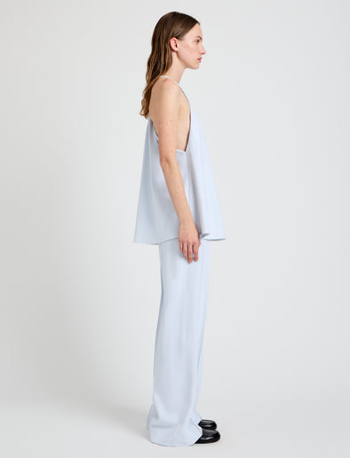 Proenza Schouler Side full length image of model wearing Weyes Pant in Matte Double Crepe in Powder Blue