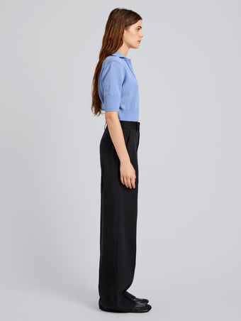 Proenza Schouler Side full length image of model wearing Reeve Polo in Cotton Knit in Pale Blue