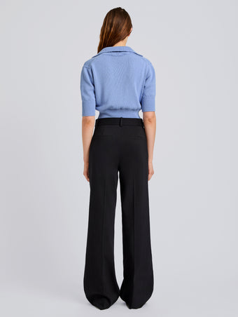 Proenza Schouler Back full length image of model wearing Reeve Polo in Cotton Knit in Pale Blue