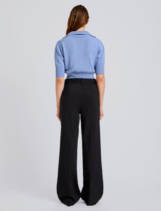 Proenza Schouler Back full length image of model wearing Reeve Polo in Cotton Knit in Pale Blue