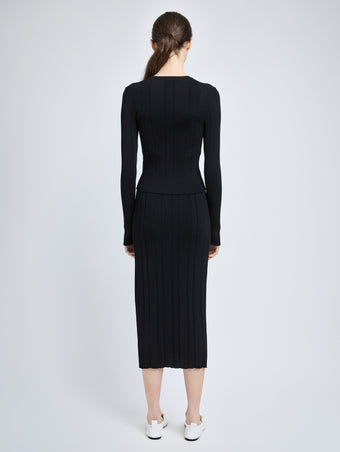 Proenza Schouler Back full length image of model wearing Ryanne Skirt in Column Rib in Black