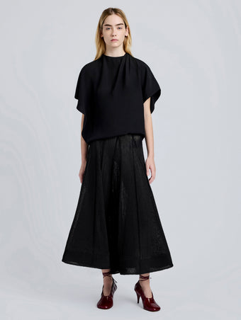Proenza Schouler Front full length image of model wearing Tavia Skirt in Viscose Fringe Knit in Black