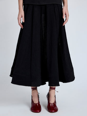 Proenza Schouler Detail full length image of model wearing Tavia Skirt in Viscose Fringe Knit in Black