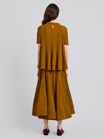 Proenza Schouler Back full length image of model wearing Tavia Skirt in Viscose Fringe Knit in Olive