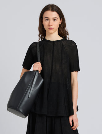 Proenza Schouler Front cropped image of model wearing Tavia Top in Viscose Fringe Knit in Black