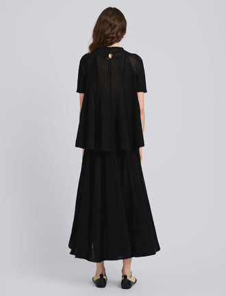 Proenza Schouler Back full length image of model wearing Tavia Top in Viscose Fringe Knit in Black