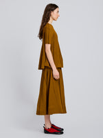 Proenza Schouler Side full length image of model wearing Tavia Top in Viscose Fringe Knit in Olive