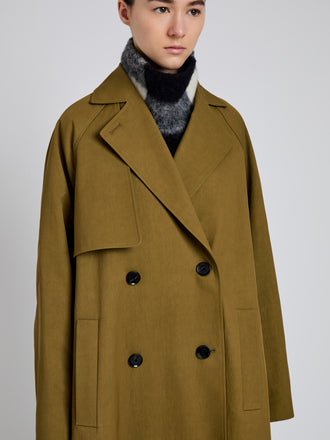 Proenza Schouler Detail image of model wearing Adelaide Coat in Cotton Viscose Trench in Moss