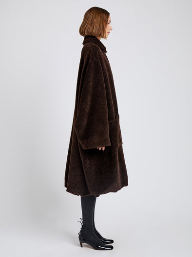 Proenza Schouler Side full length image of model wearing Verretta Coat In Alpaca Coating in Chocolate